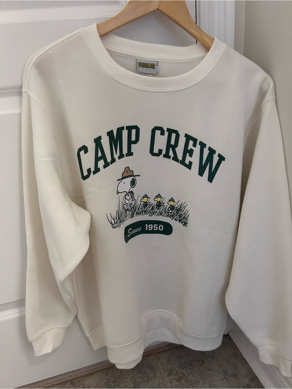 Snoopy White Crewneck Sweatshirt with Green Camp Crew Graphic
